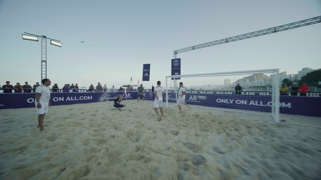 Video Reference: Clothing, Sky, Volleyball net, Active shorts, Net sports, Sports equipment, Volleyball player, Volleyball, Cloud, Beach