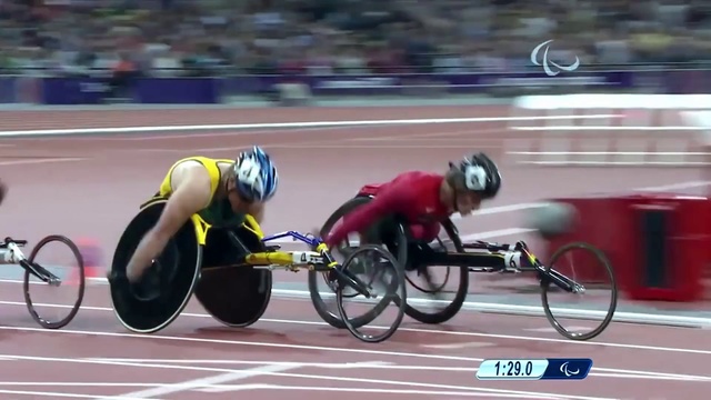 Video Reference: Wheel, Wheelchair sports, Tire, Sports uniform, Wheelchair, Disabled sports, Vehicle, Sports equipment, Muscle, Bicycle