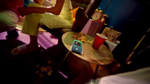 Video Reference: Shorts, Gadget, Leisure, Fun, Magenta, Electronic device, Event, Thigh, Human leg, Recreation