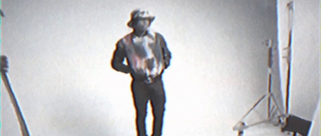 Video Reference: Sleeve, Performing arts, Art, Entertainment, Music, Musician, Event, Electric blue, Personal protective equipment, Font