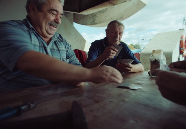 Video Reference: Table, Sky, Leisure, Wood, Tableware, Hat, Recreation, T-shirt, Event, Eyewear