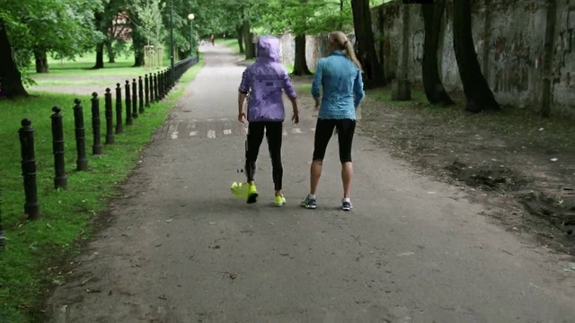 Video Reference: Shorts, Plant, Green, Tree, Botany, People in nature, Road surface, Asphalt, Grass, Thoroughfare
