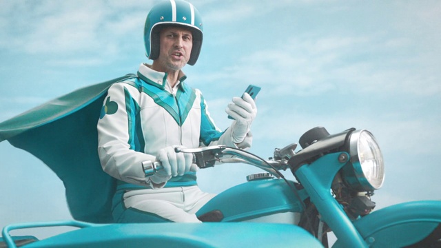 Video Reference: Sky, Cloud, Plant, Vehicle, Green, Automotive design, Motor vehicle, Helmet, Automotive lighting, Gesture