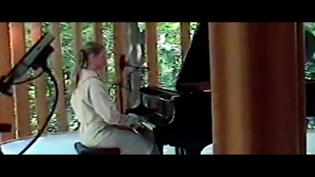 Video Reference: Helmet, Music, Tire, Font, Musician, Event, Wood, Entertainment, Sitting, Display device