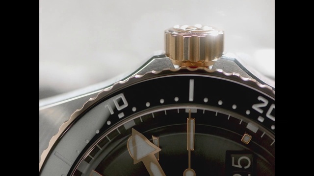 Video Reference: Font, Logo, Circle, Metal, Fashion accessory, Titanium, Brand, Macro photography, Machine, Motor vehicle