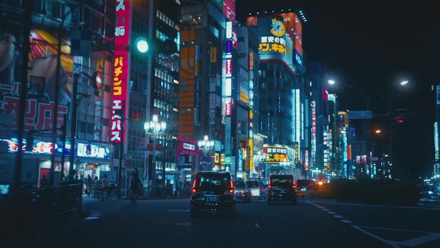 Video Reference: Building, Photograph, Car, Automotive lighting, Light, Skyscraper, Infrastructure, Electricity, Wheel, Lighting