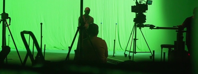 Video Reference: Tripod, Entertainment, Videographer, Microphone stand, Film studio, Camera accessory, Cameras & optics, Television studio, Event, Cinematographer