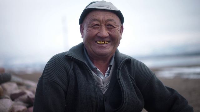 Video Reference: Glasses, Smile, Sky, Flash photography, Cap, Happy, Headgear, Travel, Wrinkle, Landscape