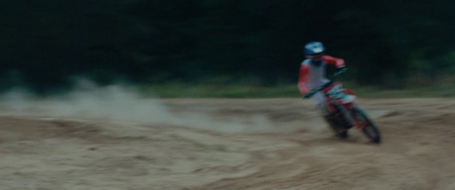 Video Reference: Helmet, Motorcycle, Motorsport, Motorcycling, Racing, Automotive tire, Landscape, Event, Stunt performer, Motorcycle racing
