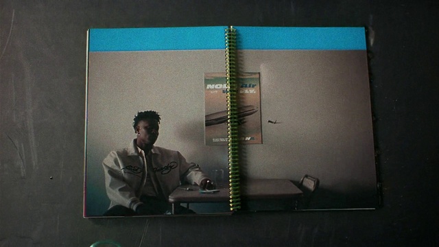 Video Reference: Rectangle, Font, Ring binder, Art, Suit, Pattern, Room, Illustration, Paper product, Visual arts