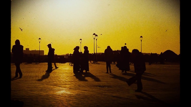 Video Reference: Sky, Daytime, People in nature, Dusk, People on beach, Sunrise, Sunset, Body of water, Gesture, Sunlight