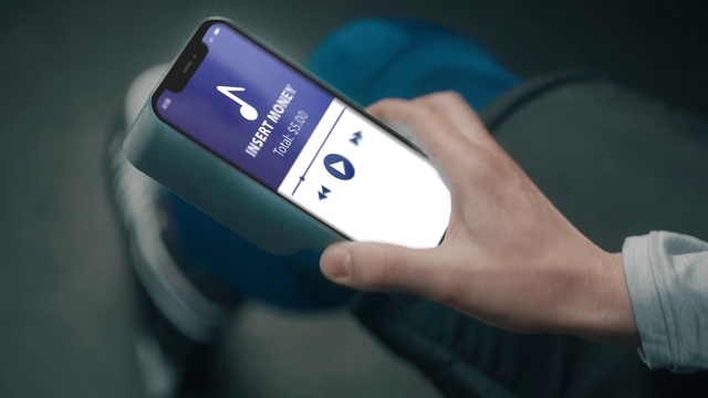 Video Reference: Communication Device, Gadget, Finger, Font, Audio equipment, Wrist, Electric blue, Gesture, Fashion accessory, Thumb