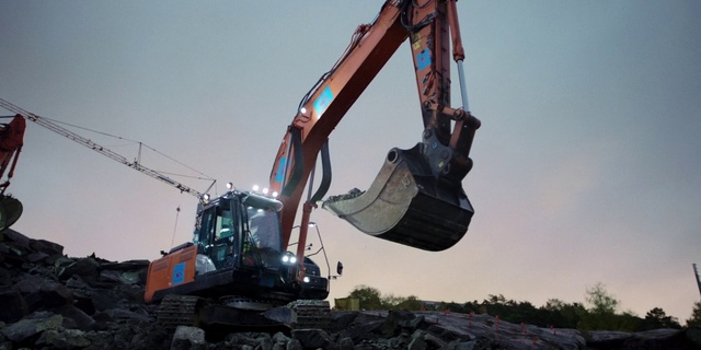 Video Reference: Sky, Vehicle, Plant, Tree, Slope, Crane, Machine, Construction equipment, Bulldozer, Landscape