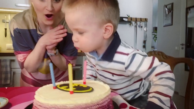 Video Reference: Face, Food, Birthday candle, Candle, Cake decorating, Cake, Picture frame, Cake decorating supply, Sharing, Chair