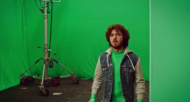 Video Reference: Tire, Wheel, Sleeve, Jacket, Musician, Music, Event, Musical instrument, Audio equipment, Microphone stand