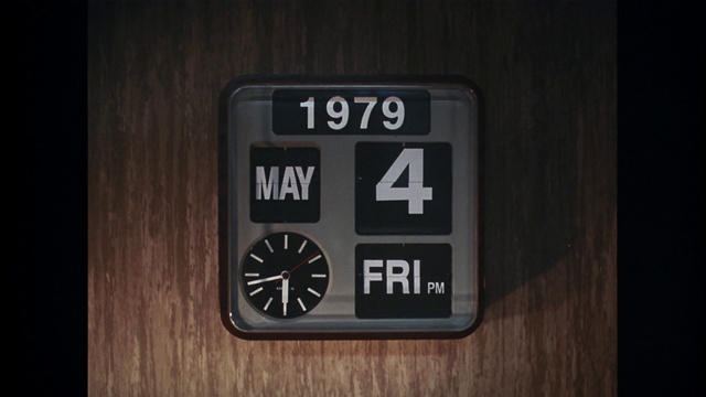 Video Reference: Clock, Grey, Gadget, Font, Gas, Communication Device, Digital clock, Alarm clock, Multimedia, Wood