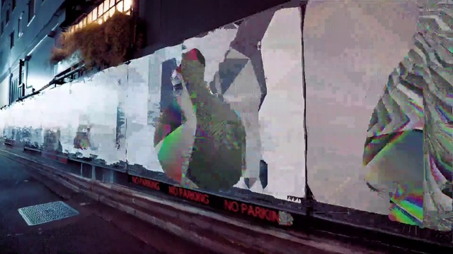 Video Reference: Architecture, Art, Graffiti, Font, Tints and shades, Rolling stock, Facade, Magenta, Entertainment, Display device