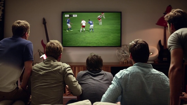 Video Reference: Clothing, Shirt, T-shirt, Interaction, Community, Television set, Sharing, Television, Display device, Gadget