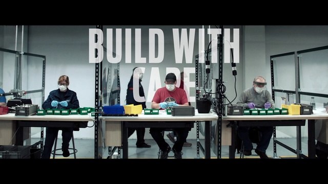 Video Reference: Table, Jacket, Event, Font, Recreation, Desk, T-shirt, Sitting, Conversation, Room