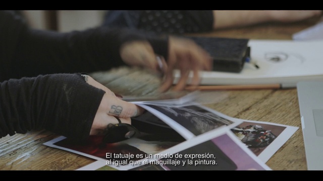 Video Reference: Sleeve, Automotive design, Gesture, Finger, Writing instrument accessory, Wood, Font, Publication, Nail, Writing implement