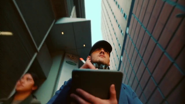 Video Reference: Hand, Cap, Audio equipment, Headgear, T-shirt, Gadget, Baseball cap, Fun, Event, Entertainment