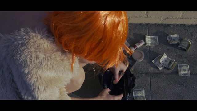 Video Reference: Fawn, Wig, Fur clothing, Toy, Eyewear, Red hair, Long hair, Bangs, Asphalt, Fur