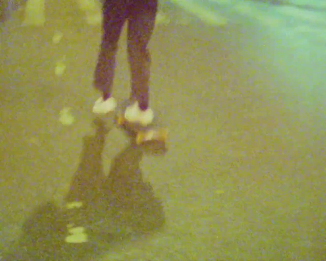 Video Reference: Gesture, Knee, Thigh, Foot, Tints and shades, Human leg, Flooring, Event, Shadow, Electric blue