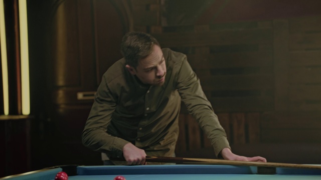 Video Reference: Table, Baize, Shirt, Pool player, Billiard table, Cue stick, Recreation room, Billiard room, Wood, Sleeve