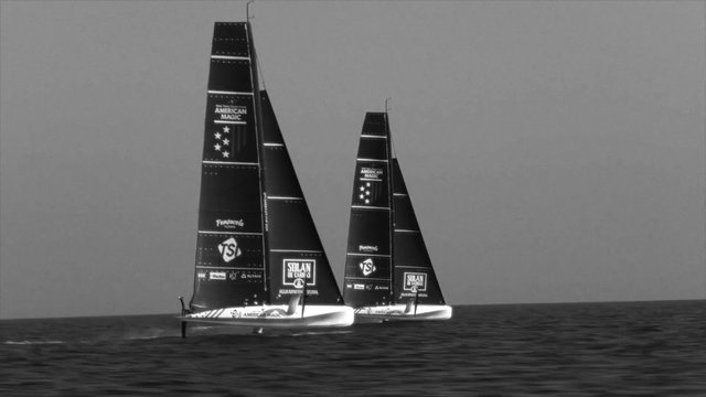 Video Reference: sailboat, yacht, racing, ocean, water, sailing, regatta, black and white, boats, open sea, sails, sport