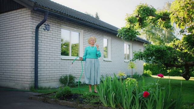 Video Reference: Plant, Flower, Building, Window, Green, People in nature, House, Sky, Botany, Door