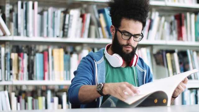 Video Reference: Glasses, Bookcase, Photograph, Shelf, Book, Publication, Vision care, Shelving, Eyewear, Beard