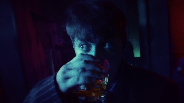 Video Reference: Jaw, Flash photography, Gesture, Electric blue, Tableware, Darkness, Fun, Entertainment, Flesh, T-shirt