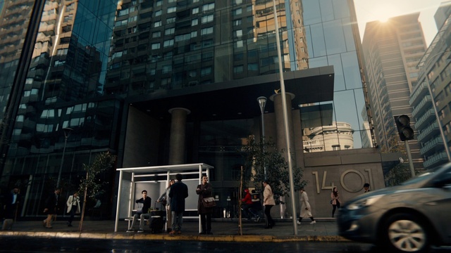 Video Reference: Wheel, Tire, Building, Skyscraper, Vehicle, Car, Window, Tower block, Urban design, City