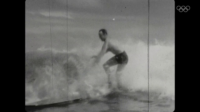 Video Reference: Water, Sports equipment, Flash photography, Knee, Shorts, Surfing Equipment, Tints and shades, Surfboard, Monochrome photography, Chest