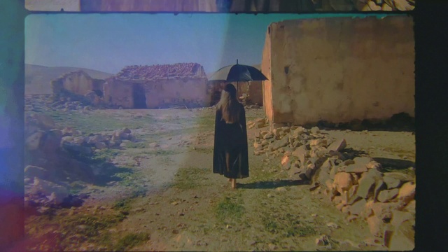 Video Reference: World, Umbrella, Wall, Art, Adaptation, Landscape, Sky, Tints and shades, Grass, Grassland