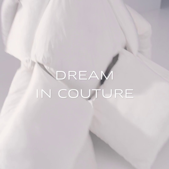 Video Reference: Petal, Sleeve, Grey, Font, Collar, Formal wear, Fashion accessory, Linens, Pattern, Rim