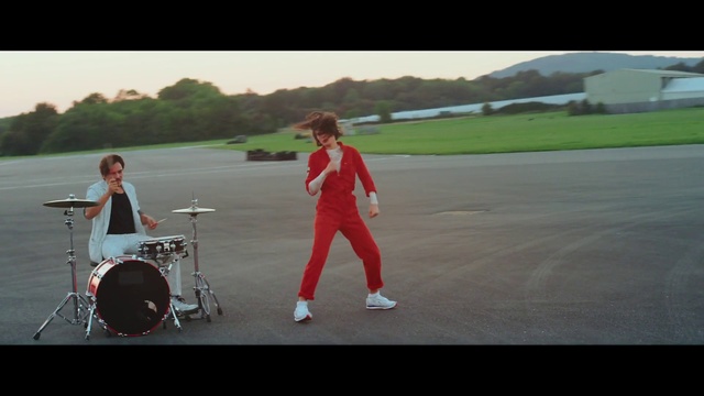 Video Reference: Membranophone, Drum, Musical instrument, Idiophone, Gesture, Musician, Asphalt, Drumhead, Sky, Cymbal