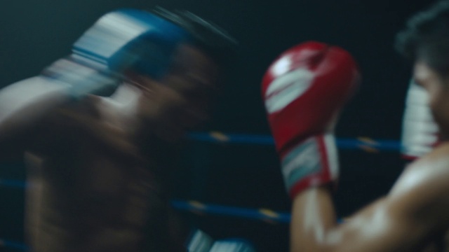 Video Reference: Sports gear, Sports equipment, Gesture, Elbow, Glove, Electric blue, Striking combat sports, Boxing, Wrist, Human leg
