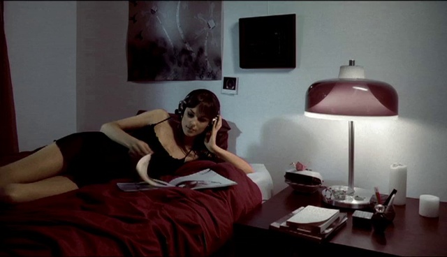 Video Reference: Shoulder, Furniture, Picture frame, Table, Comfort, Lighting, Interior design, Knee, Thigh, Lamp