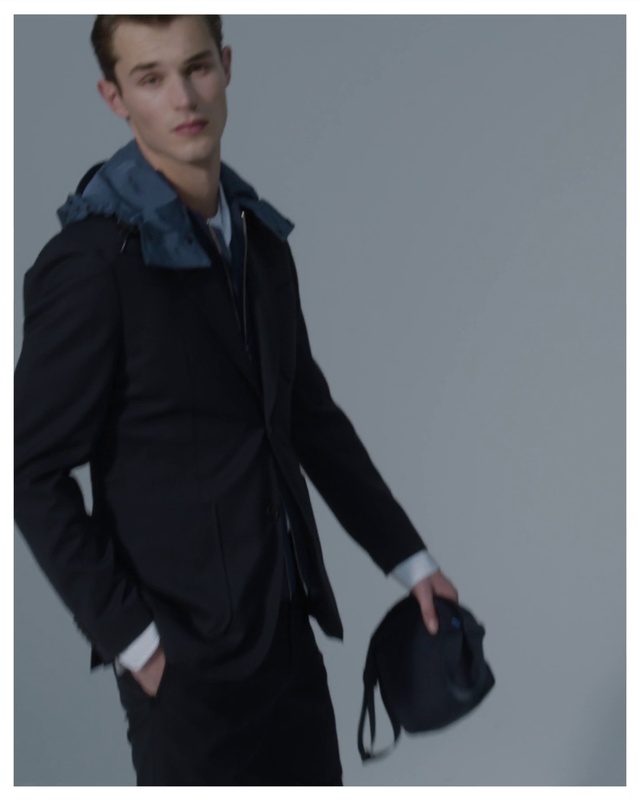 Video Reference: Shoulder, Neck, Sleeve, Overcoat, Waist, Gesture, Collar, Street fashion, Dress shirt, Blazer