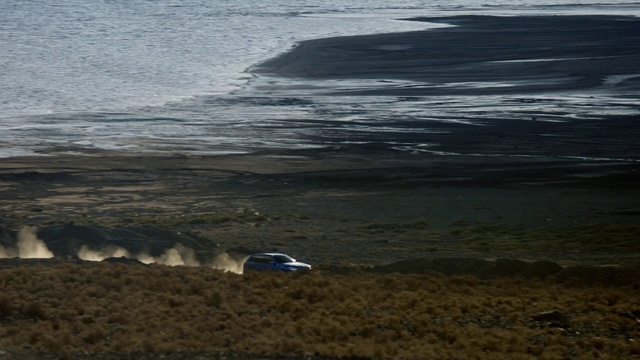 Video Reference: Water, Wheel, Tire, Vehicle, Car, Terrain, Grass, Beach, Sky, Landscape