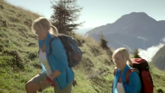 Video Reference: Sky, Plant community, People in nature, Mountain, Shorts, Outdoor recreation, Natural landscape, Travel, Luggage and bags, Happy