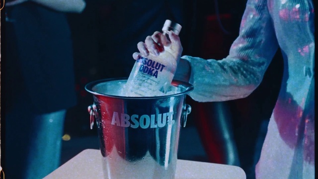 Video Reference: Drinkware, Fluid, Liquid, Alcoholic beverage, Gesture, Sleeve, Drink, Electric blue, Water, Barware