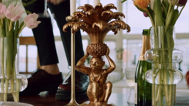 Video Reference: Photograph, Plant, Interior design, Wood, Sculpture, Drinkware, Artifact, Tree, Statue, Glass