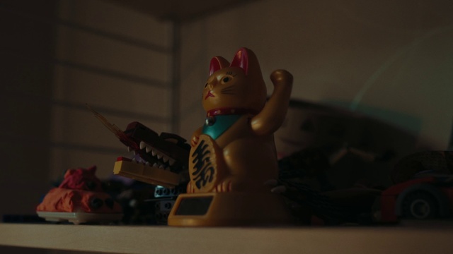 Video Reference: Toy, Art, Event, Fictional character, Carmine, Action figure, Recreation, Felidae, Visual arts, Stuffed toy