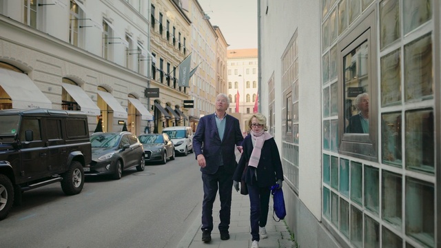 Video Reference: Tire, Car, Wheel, Building, Vehicle, Window, Motor vehicle, Neighbourhood, Street fashion, Sidewalk