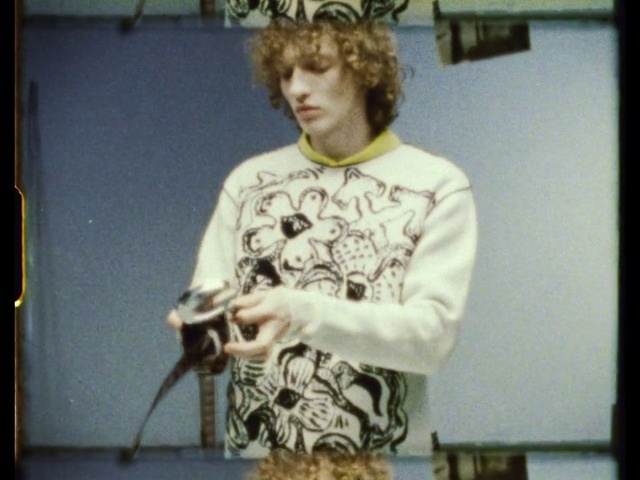 Video Reference: Human body, Jaw, Sleeve, T-shirt, Artist, Jheri curl, Music, Art, Event, Visual arts