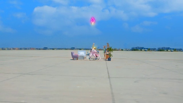 Video Reference: Sky, Cloud, Azure, People on beach, Toy, Body of water, Horizon, Balloon, Travel, Aircraft