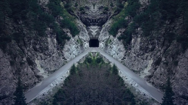 Video Reference: Water, Plant, Natural landscape, Landscape, Geological phenomenon, Symmetry, Tree, Road, Hinterland, Rock