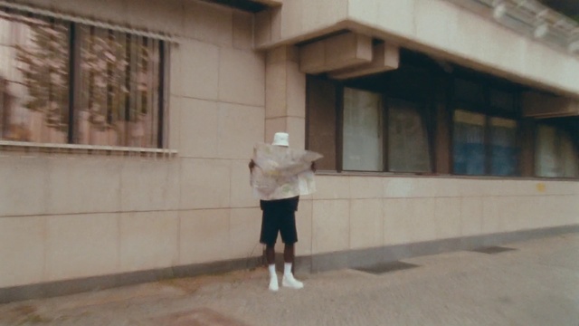 Video Reference: Leg, Building, Shorts, Window, Standing, Flooring, Facade, Wood, Concrete, House